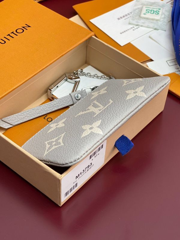 l0vis Vvtt0n key pouch bicolor monogram empreinte leather