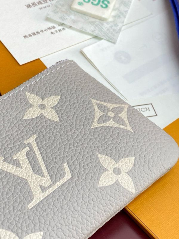 l0vis Vvtt0n key pouch bicolor monogram empreinte leather